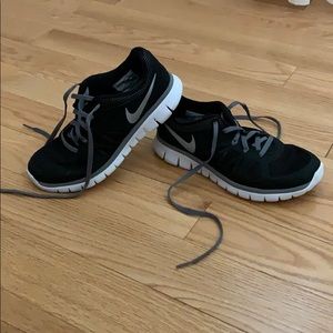 Black, white & silver NIKE running shoes